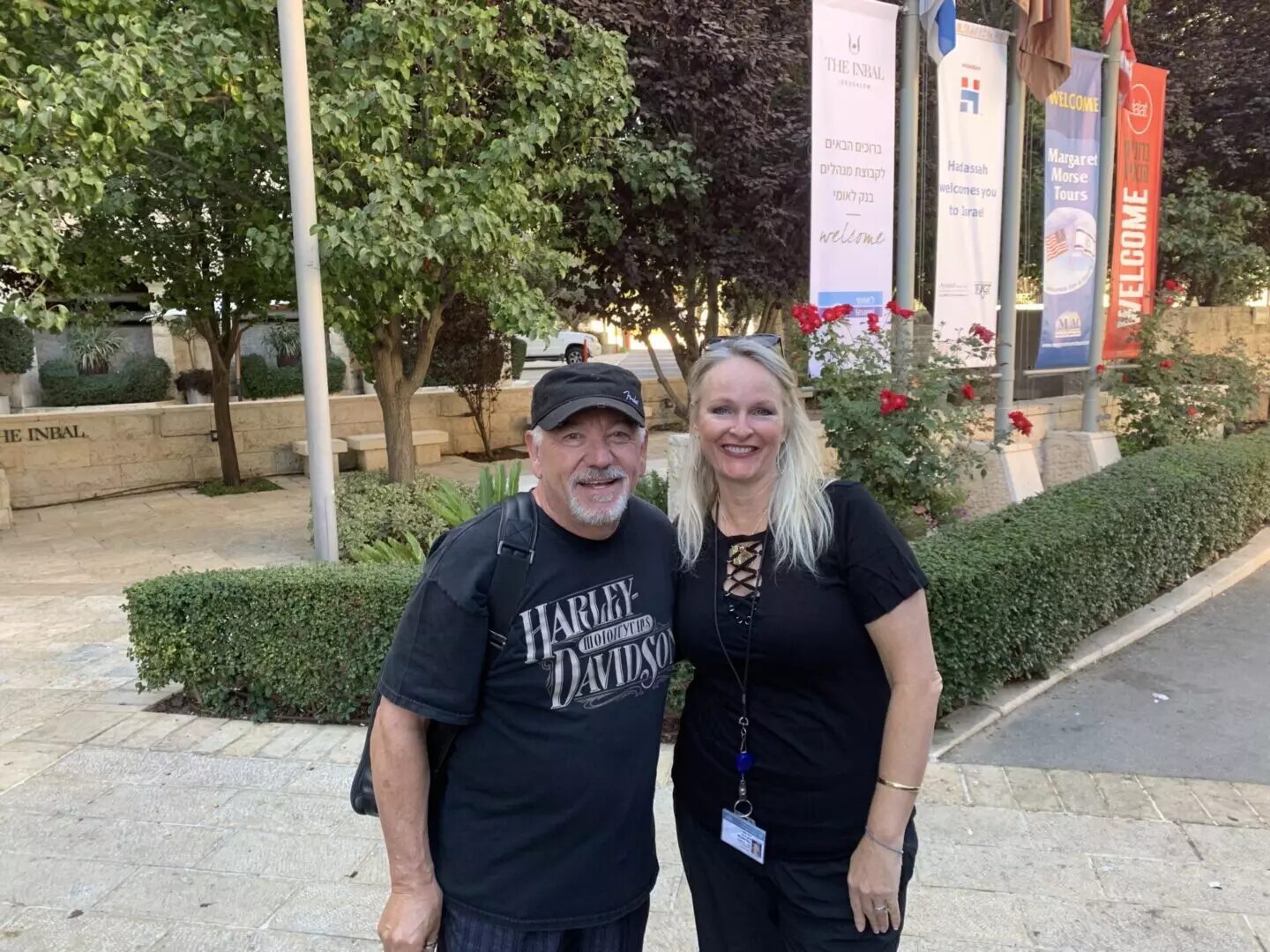 A man and woman standing next to each other.